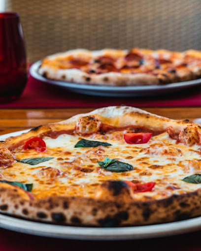 مطعم توماتو في إنتركونتيننتال مسقط - Oman|Area|114 Al Shati St|Al Kharjiya Street