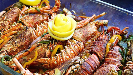 بيع وشوي الاسماك والصناعات البحرية - مخيليف - +968 9297 6336