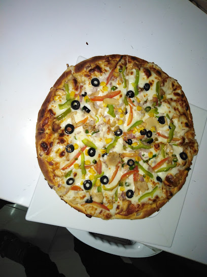 بيتزا ميكس مقهي الباکستانی - Oman|Izki|WQG2+5GQ